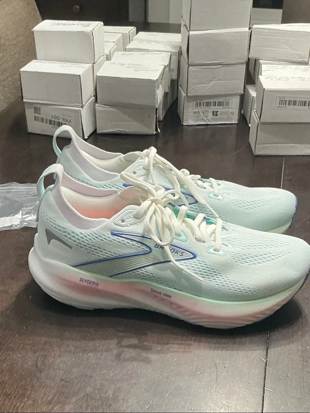Brooks Women’s White Running Shoes with Blue and Pink Accents